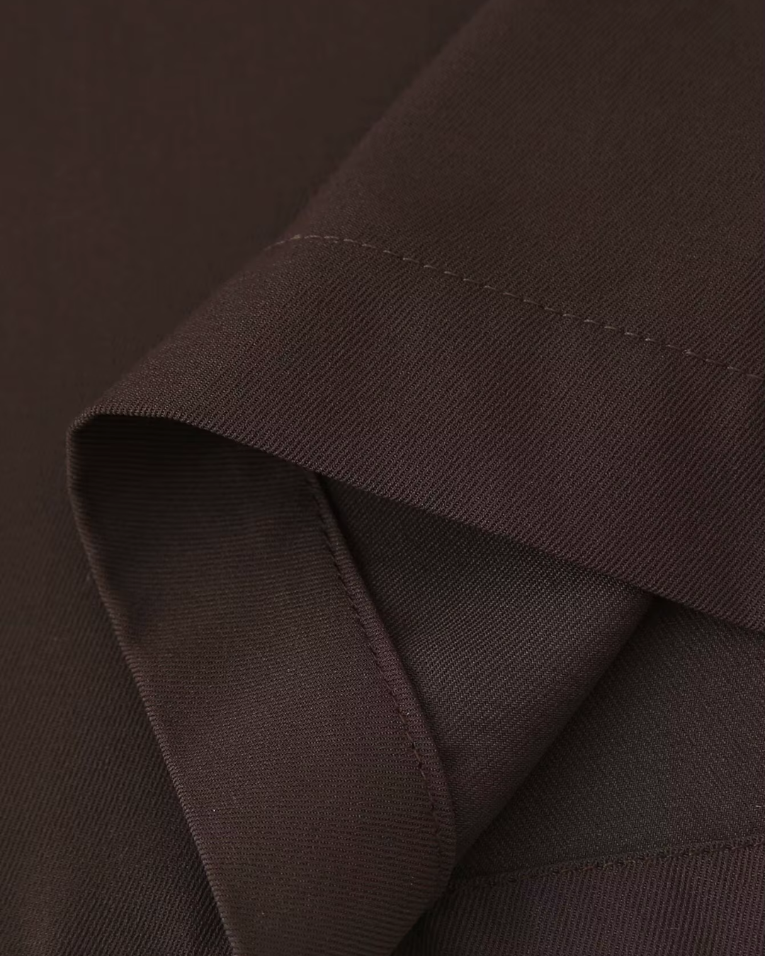 High-Waisted Belted Pleated Wide-Leg Trousers in Dark Brown