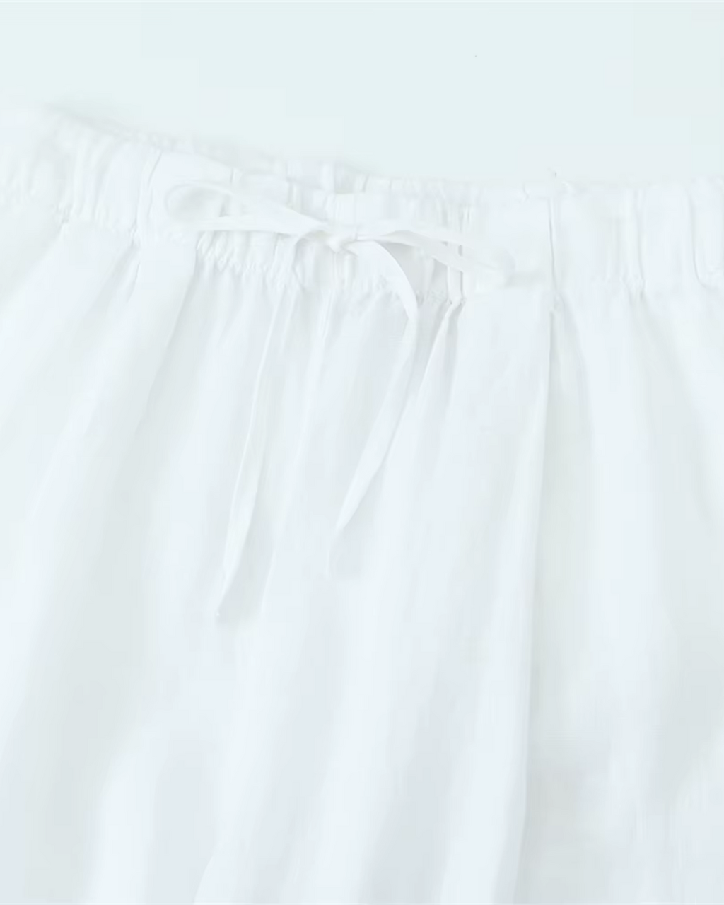 High-Waisted Drawstring Wide-Leg Linen Trousers in Beige