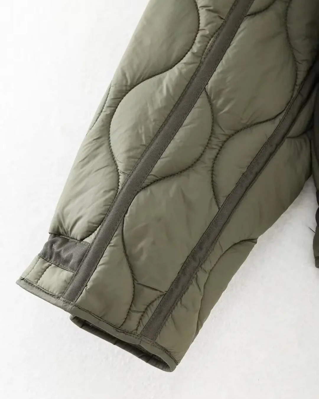 Quilted High-Neck Puffer Jacket with Drawstring in Taupe