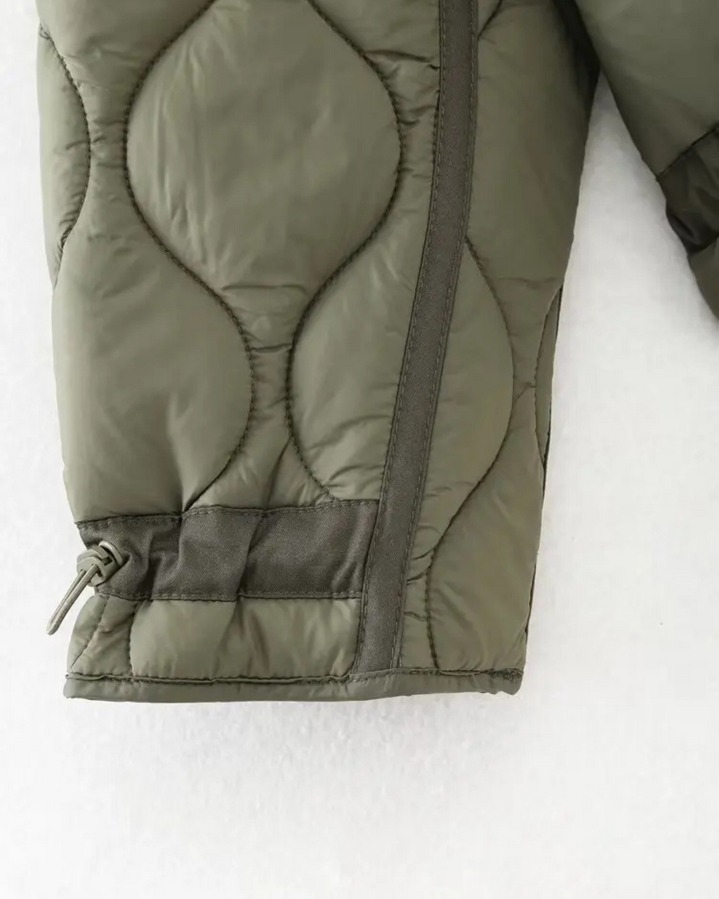 Quilted High-Neck Puffer Jacket with Drawstring in Taupe