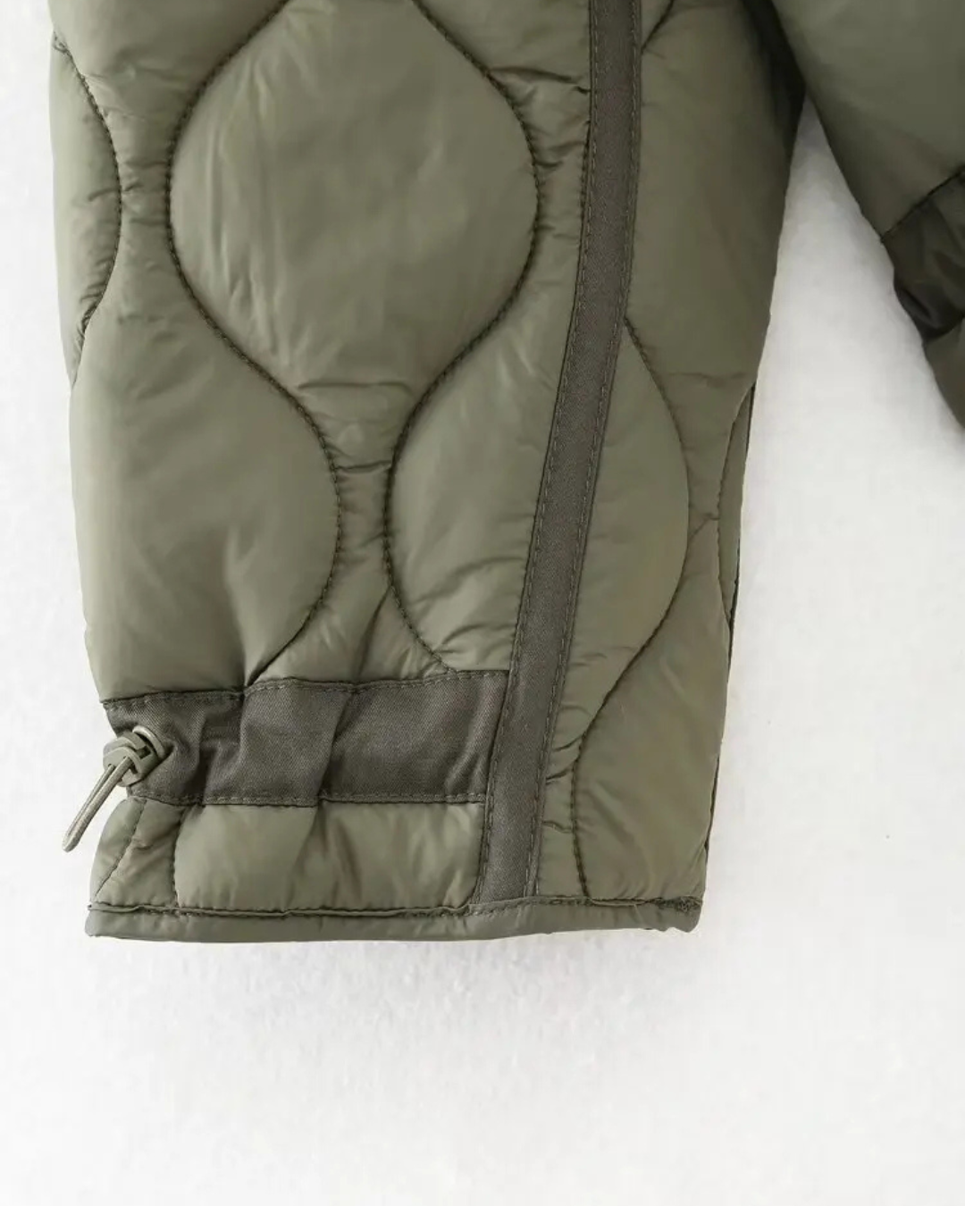 Quilted High-Neck Puffer Jacket with Drawstring in Taupe