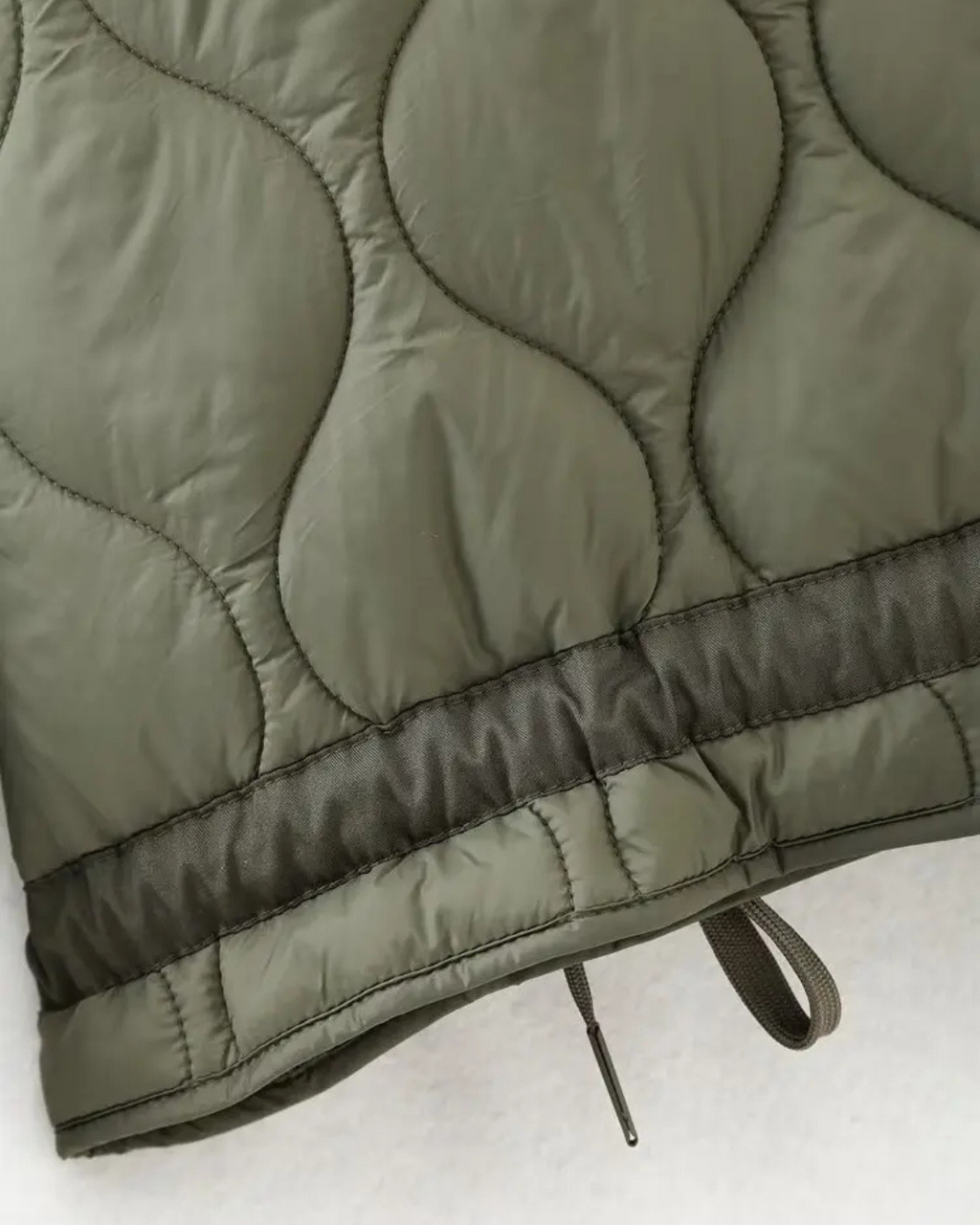 Quilted High-Neck Puffer Jacket with Drawstring in Taupe