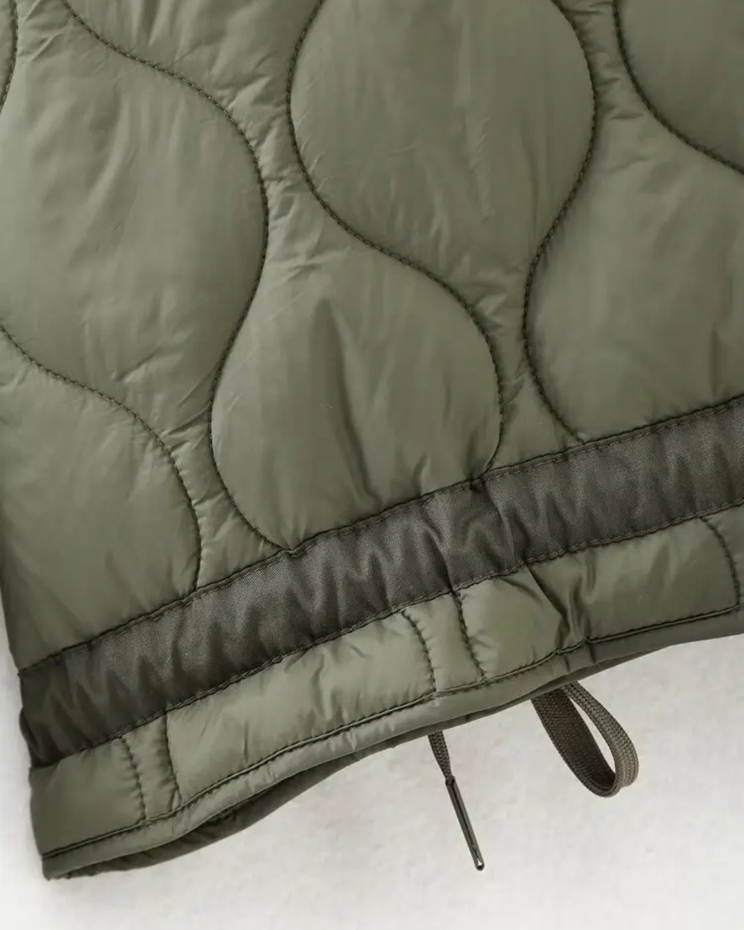 Quilted High-Neck Puffer Jacket with Drawstring in Taupe