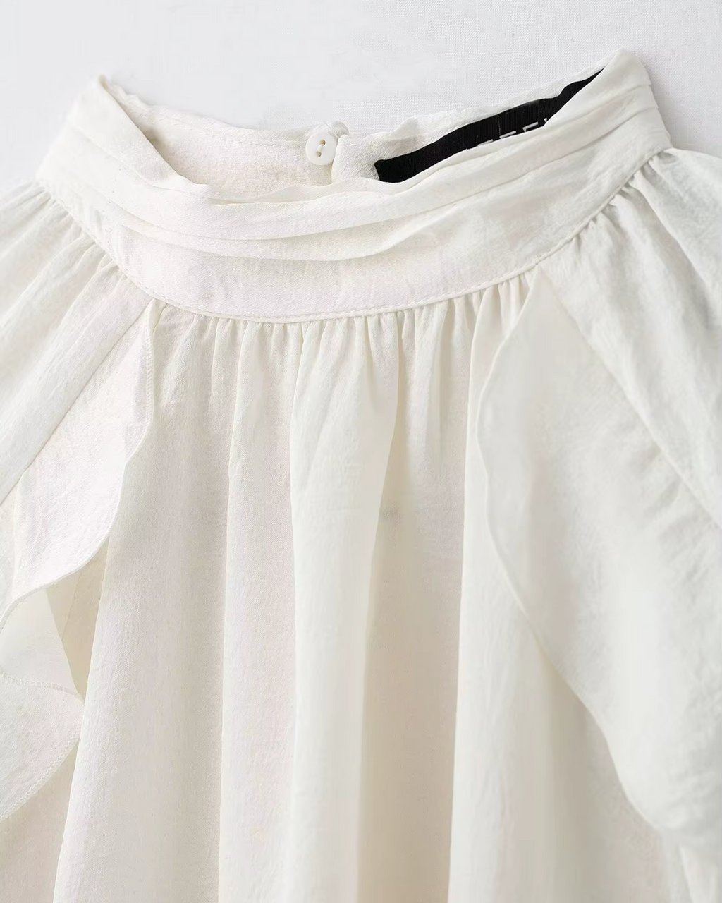 High-Neck Ruffled Chiffon Blouse in Creamy Off-White